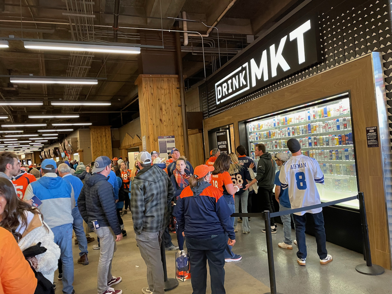 Sports apparel store near Empower Field at Mile High ready for new